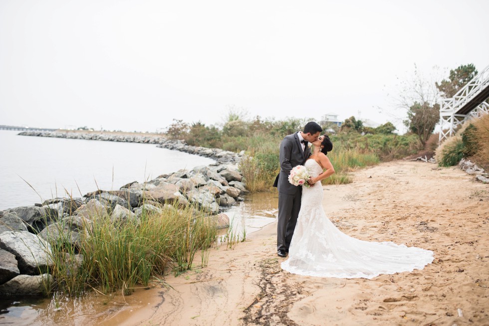 Chesapeake Bay bridge in the background of wedding portraits on the Beach