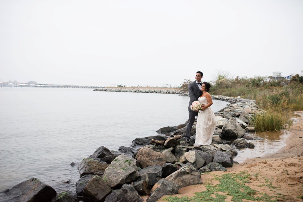 Chesapeake Bay bridge in the background of wedding portraits on the Beach