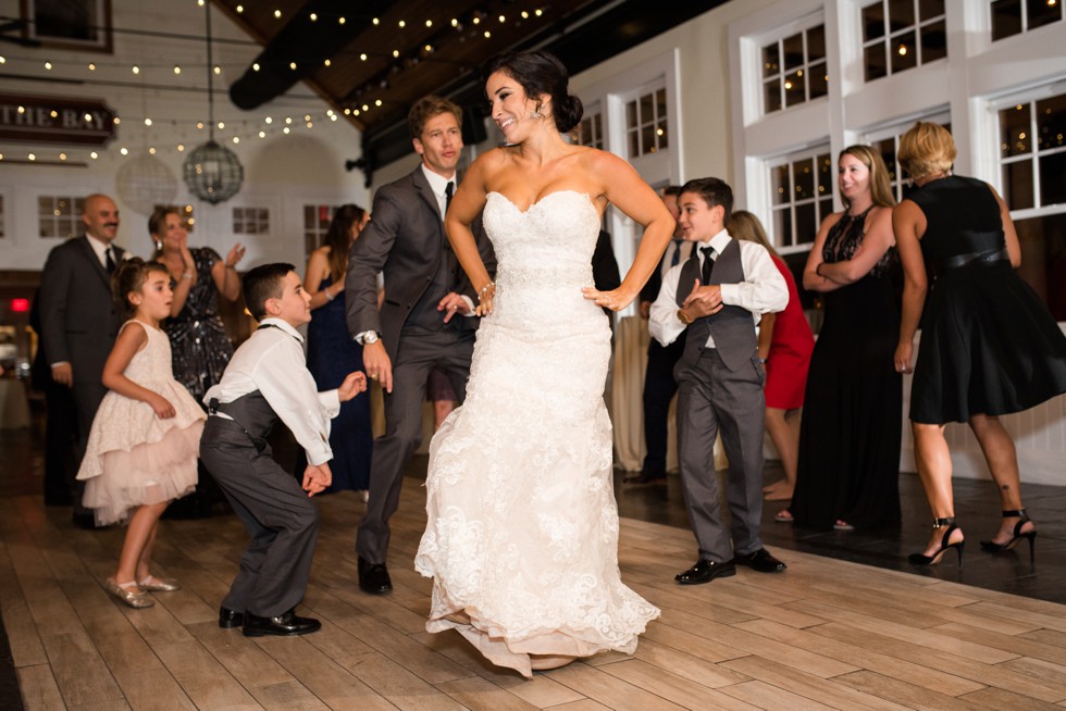 Bride dancing to gangnam style at the Chesapeake Bay Beach Club reception with District Remix DJ's