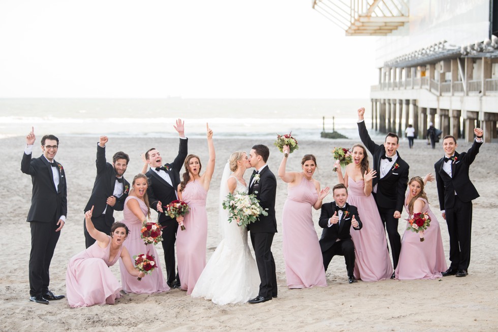 Wedding party in pink and black tux on the Atlantic City Boardwalk at One Atlantic wedding