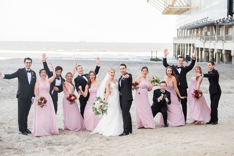 Wedding party in pink and black tux on the Atlantic City Boardwalk at One Atlantic wedding