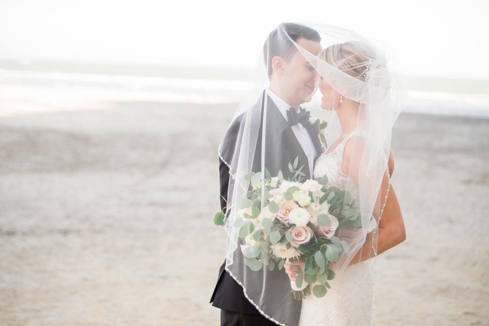 Veil over the bride on the beach in Atlantic City NJ