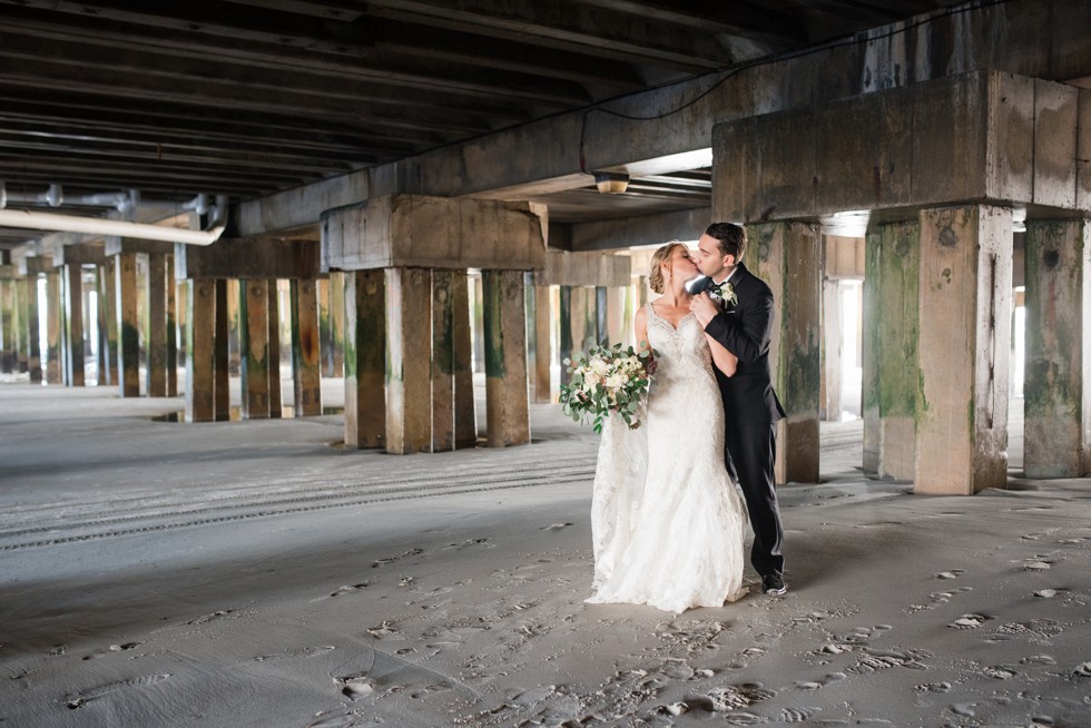 NJ Shore Wedding couple under the One Atlantic Pier