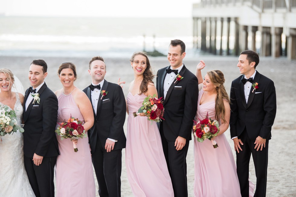 Wedding party in pink and black tux on the Atlantic City Boardwalk at One Atlantic wedding