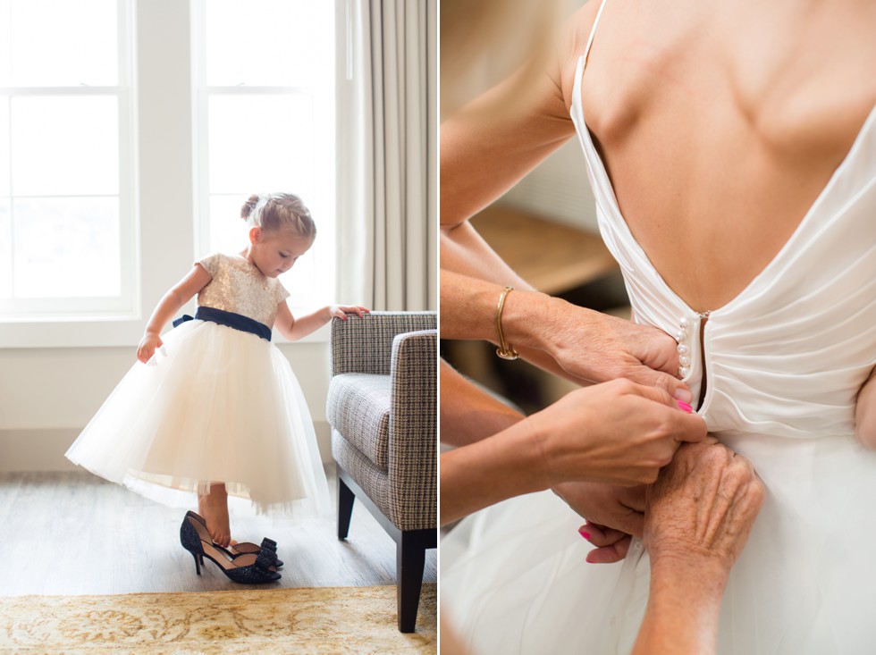 Flower girl trying on the bride's shoes at The Inn at the Chesapeake Bay Beach Club