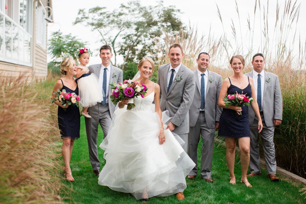 Wedding Party walking together on the beach at the Chesapeake Bay Beach Club