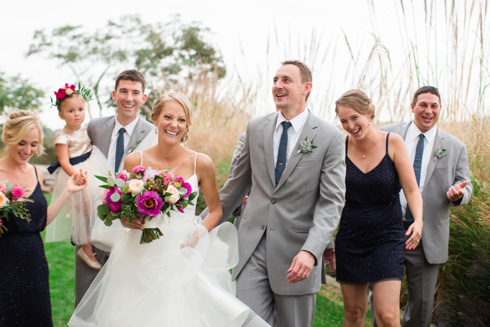 Wedding Party walking together on the beach at the Chesapeake Bay Beach Club