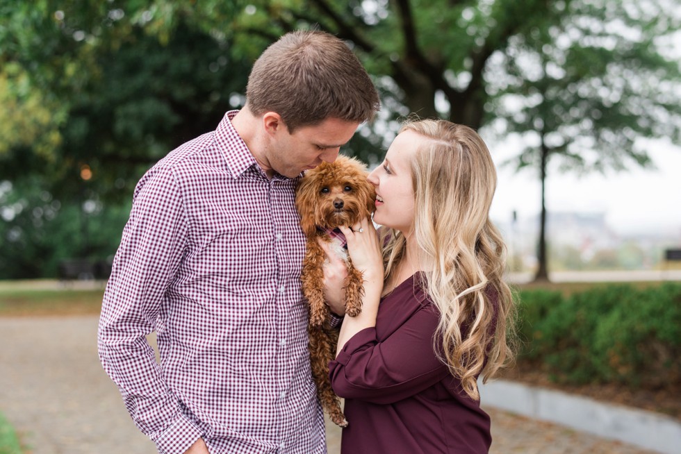 Maltipoo in a couple's engagement photos on Federal Hill