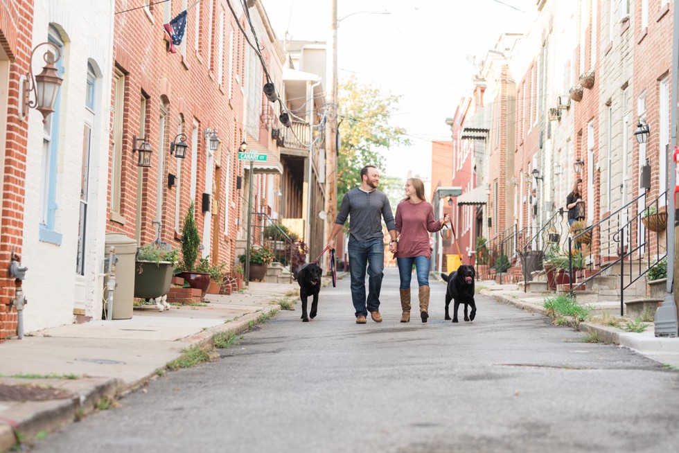 Patterson Park Pagoda Engagement photos with two black labs