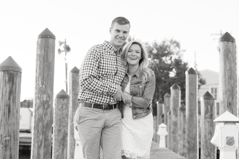 city dock engaged couple black and white