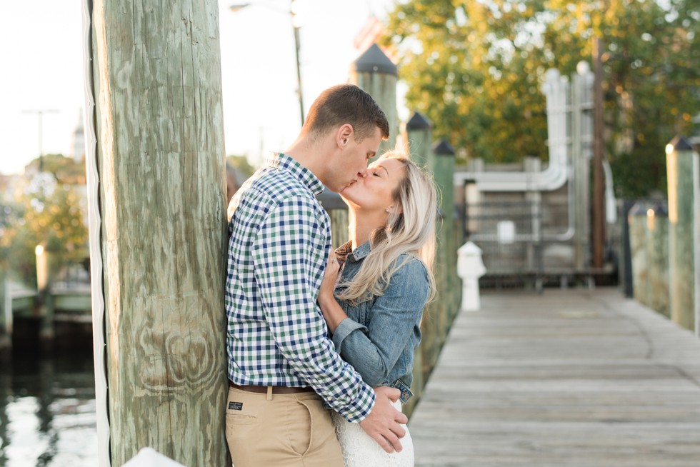 Annapolis city dock engaged couple in jean jacket