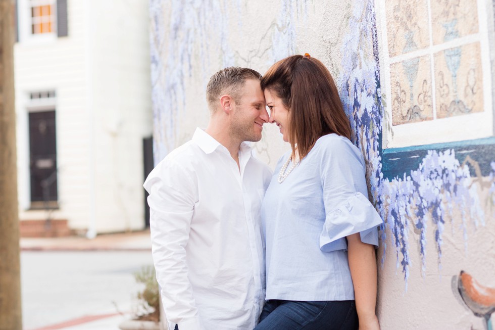 Engaged couple on Annapolis Mural