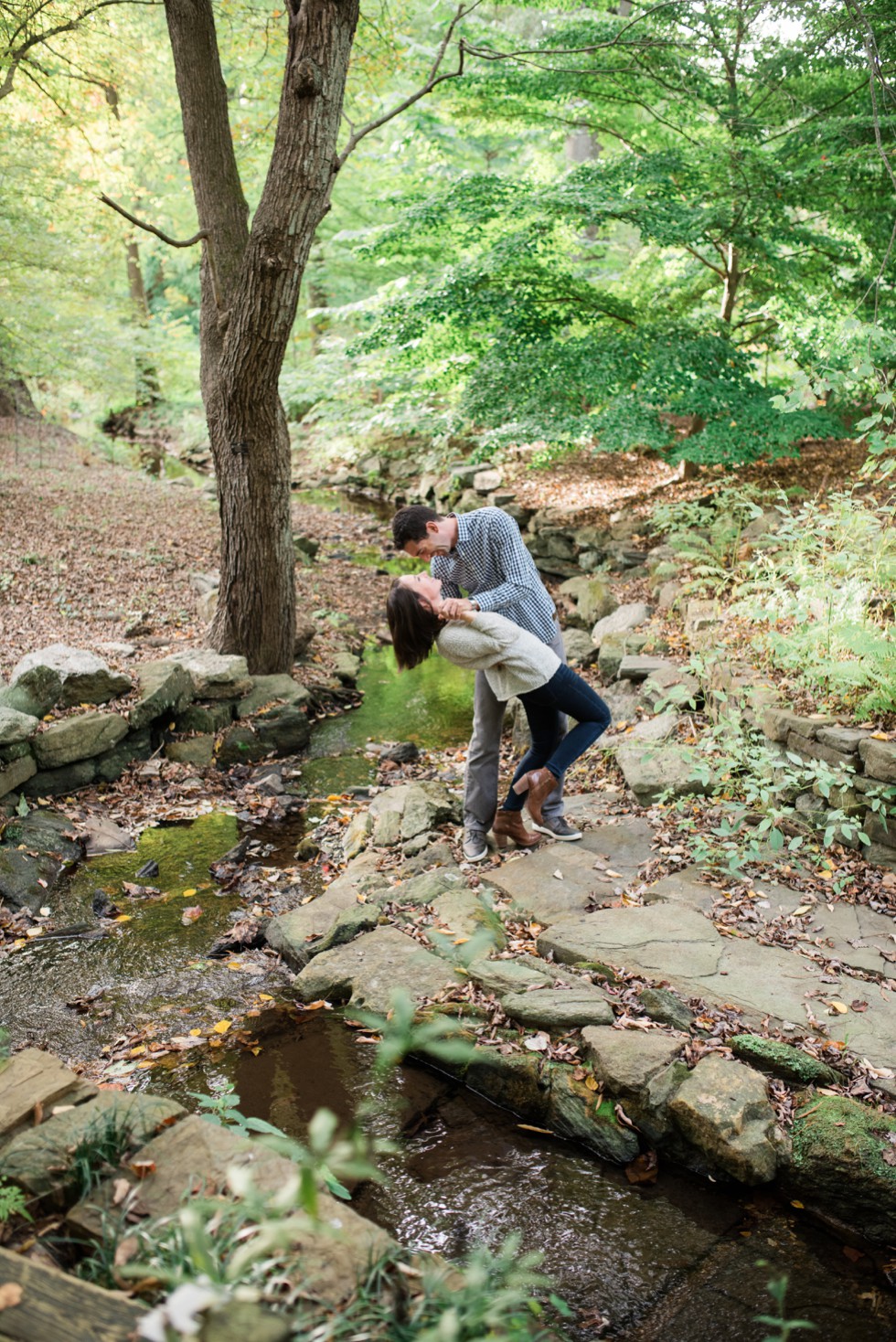 Wissahickon Creek engagement photos at Morris Arboretum