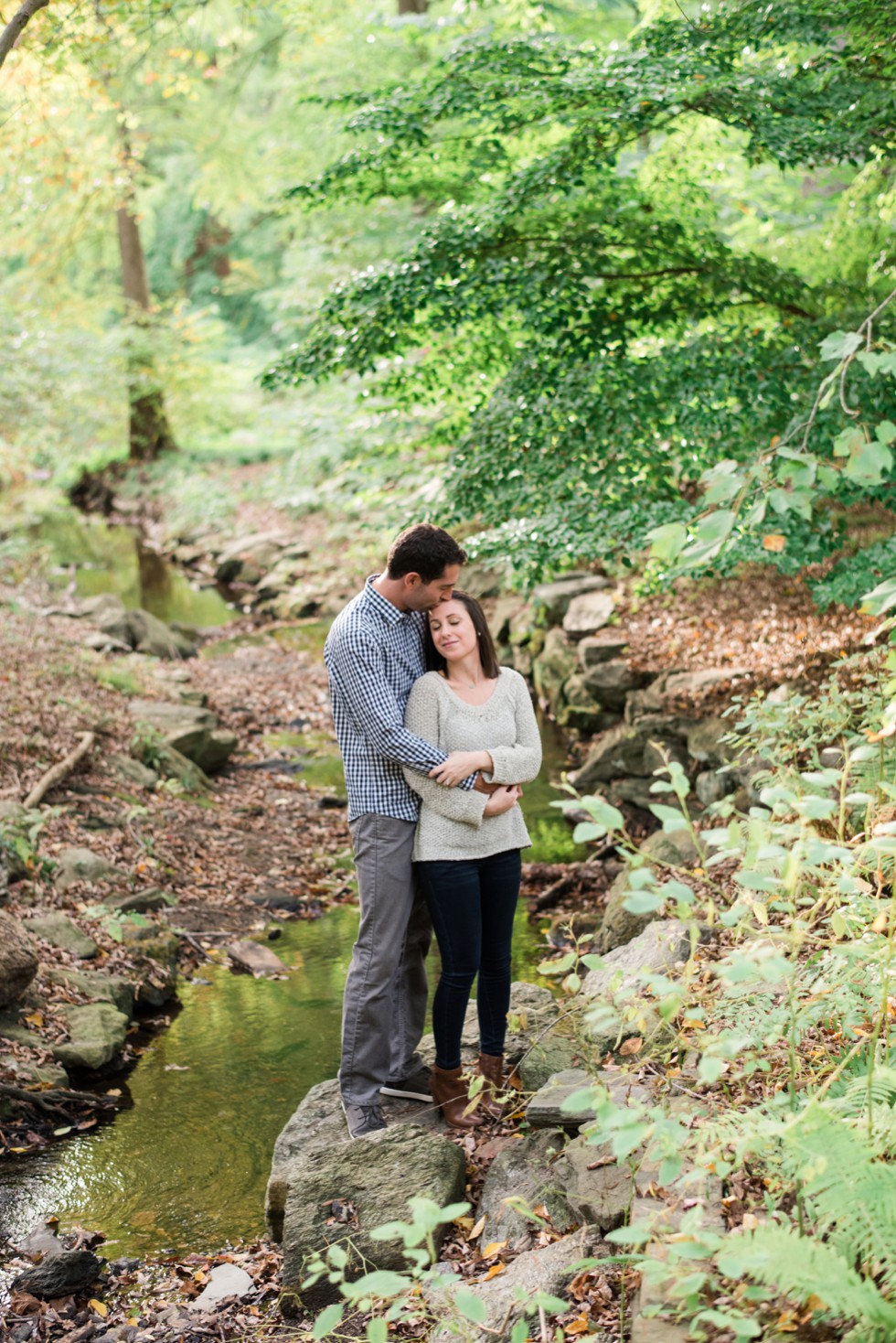 Wissahickon Creek engagement photos at Morris Arboretum