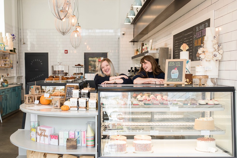 display case and employees at Cake Life Bake Shop