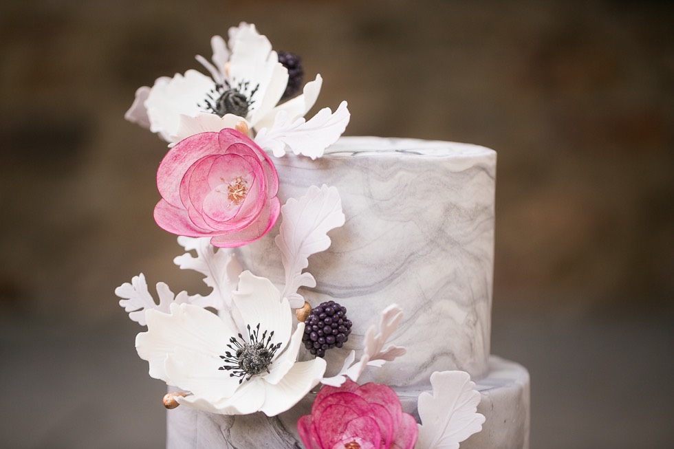 top of wedding cake with flower details