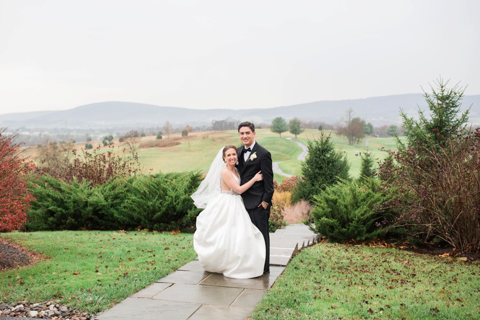 bride and groom on mountain in Frederick