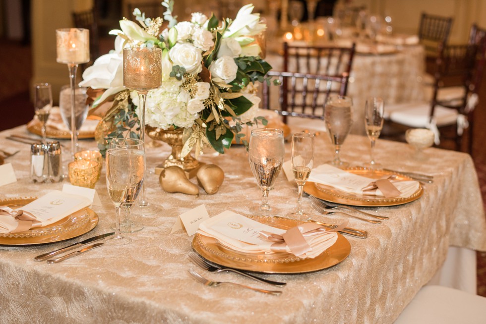 gold pears magnolia and gold chargers Wicked Willow Event Florals 