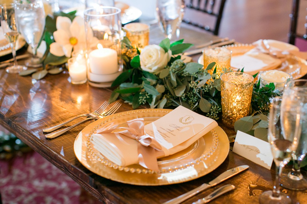 gold pears magnolia and gold chargers Wicked Willow Event Florals 