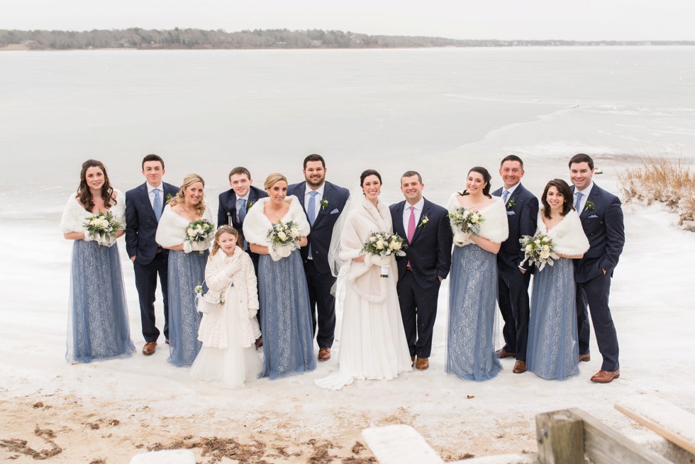 Snowy winter wedding party Waquoit Bay Cape Cod