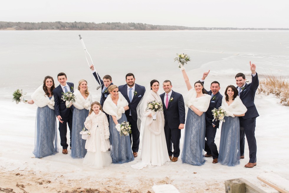 Snowy winter wedding party Waquoit Bay Cape Cod