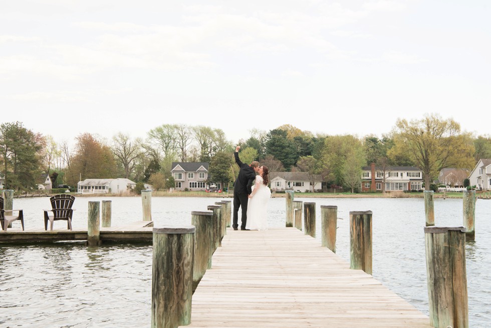 bride and groom on a dock