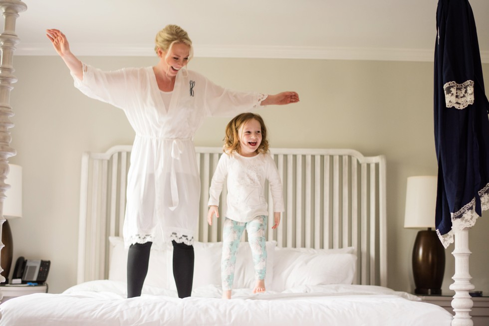 bride jumping on the bed