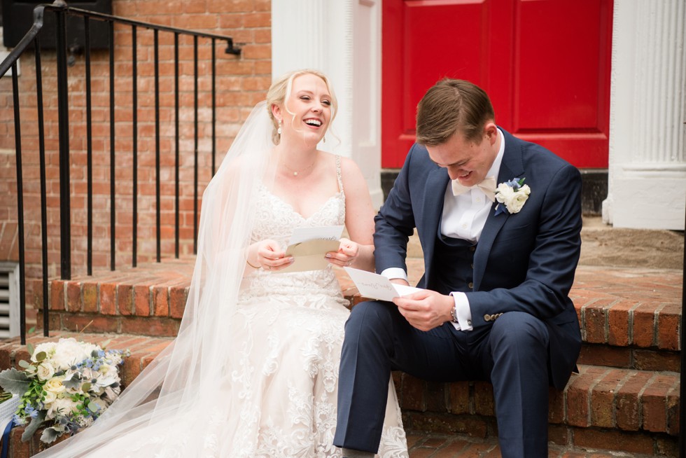 bride and groom reading vows before wedding