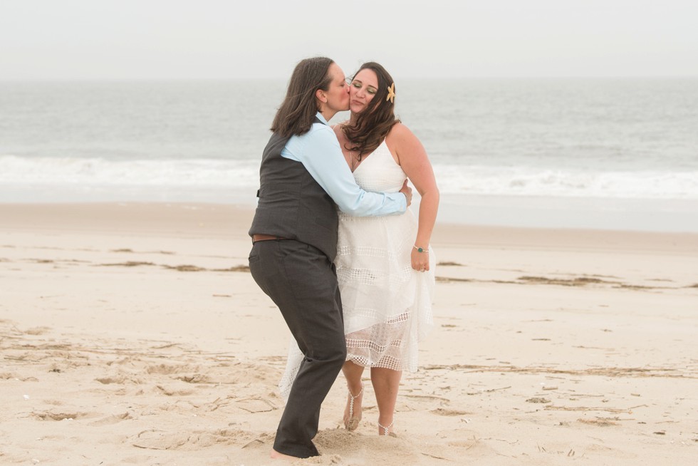 brides wedding photographs on the beach