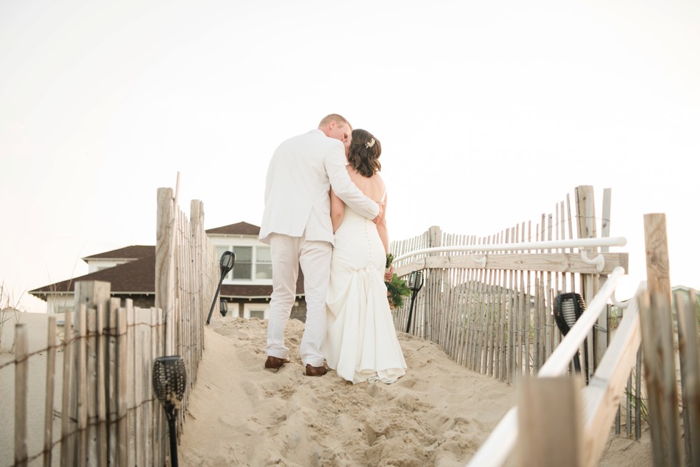 Beach sunset bride and groom