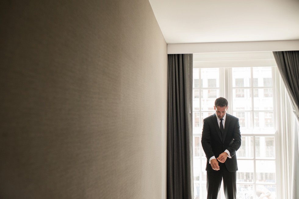 groom getting ready at Le Meridien