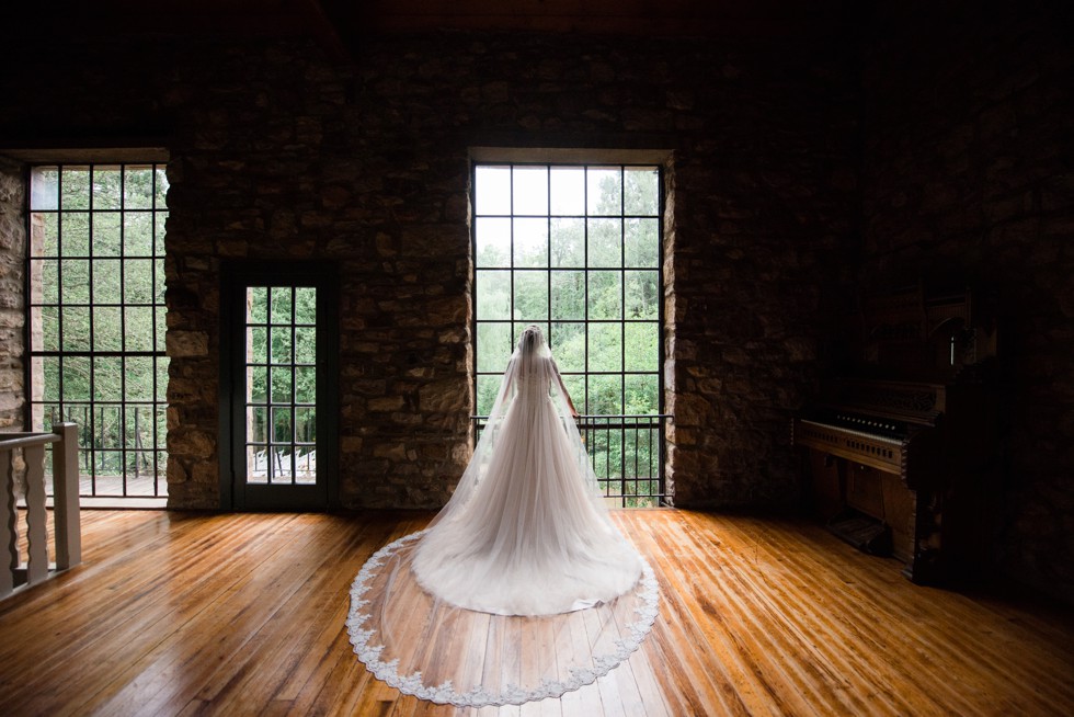 Holly Hedge estate bride and groom in front of Windows