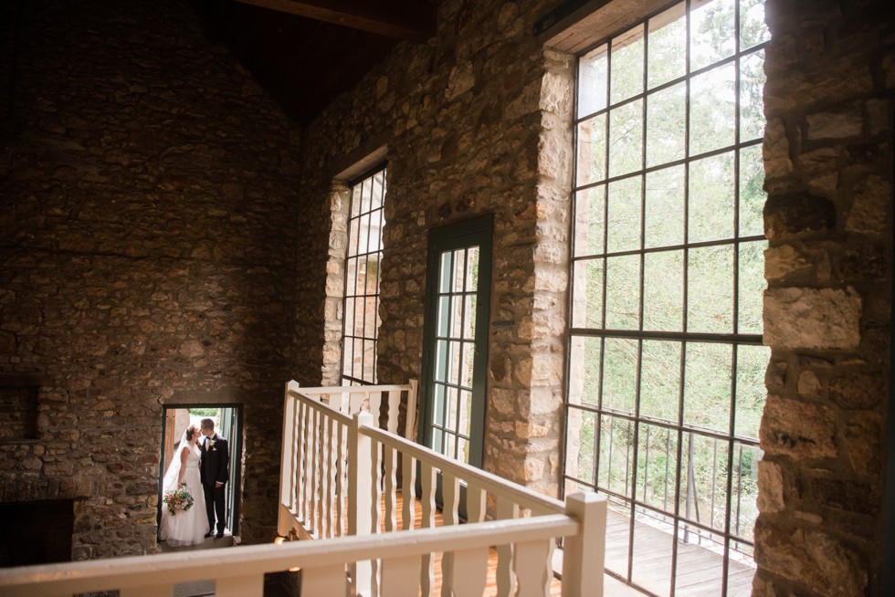 Holly Hedge estate bride and groom in front of Windows