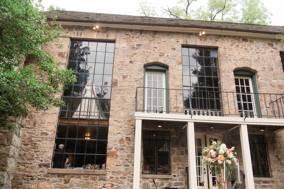 Holly Hedge estate bride and groom in front of Windows