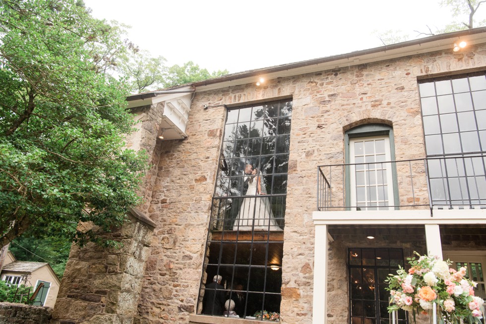 Holly Hedge estate bride and groom in front of Windows