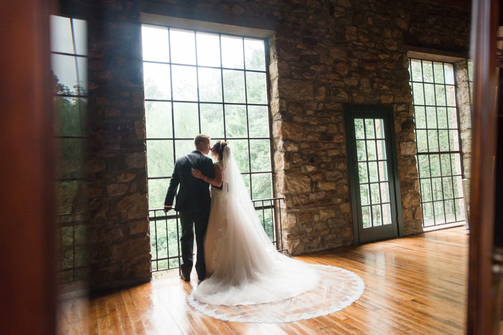 Holly Hedge estate bride and groom in front of Windows