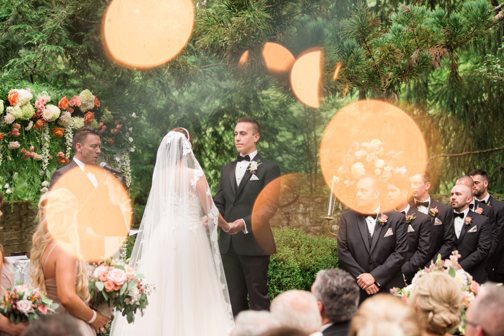 Holly Hedge estate wedding ceremony with rose petals