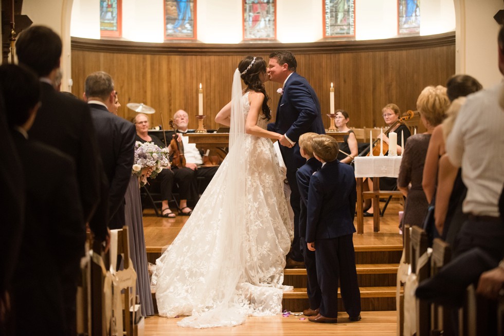 Trinity Cathedral wedding ceremony first kiss