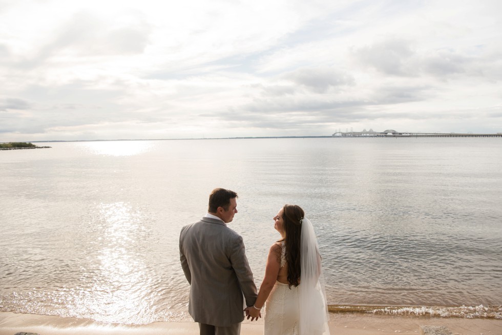 bride and groom on the eastern shore beach at sunset