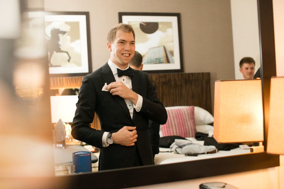 Groom getting ready Delta Hotels by Marriott Baltimore Inner Harbor 