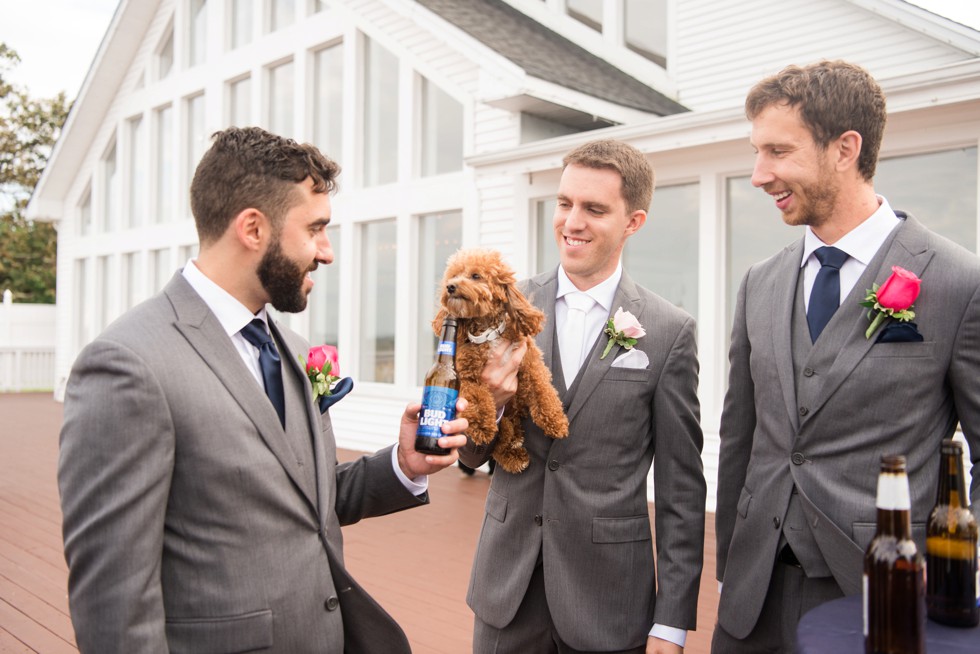 Maryland waterfront wedding party with puppies