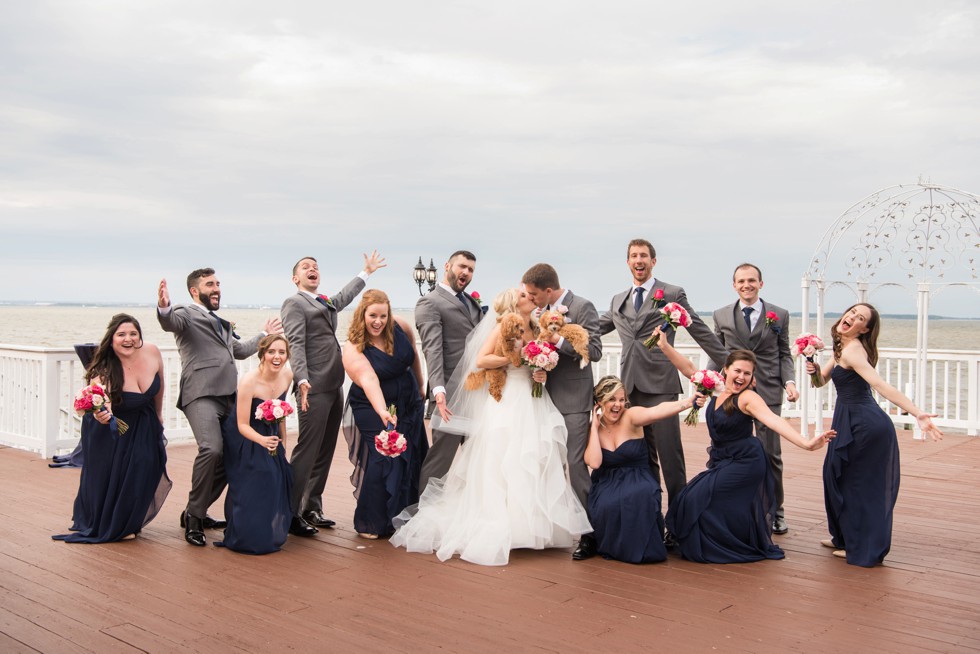 Maryland waterfront wedding couple with puppies