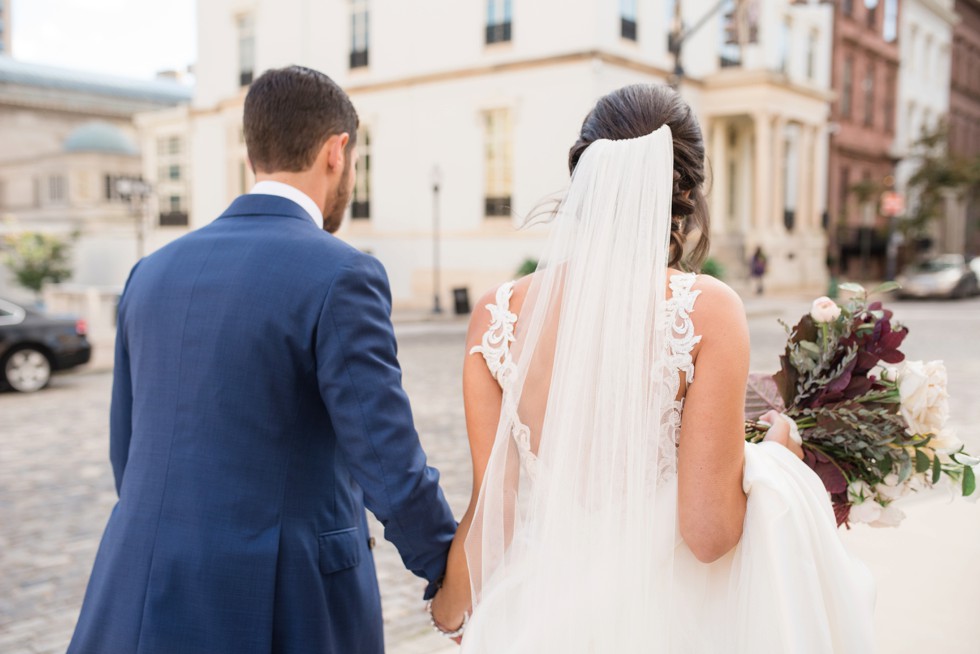 Wedding photos in Mount Vernon Place near George Peabody Library