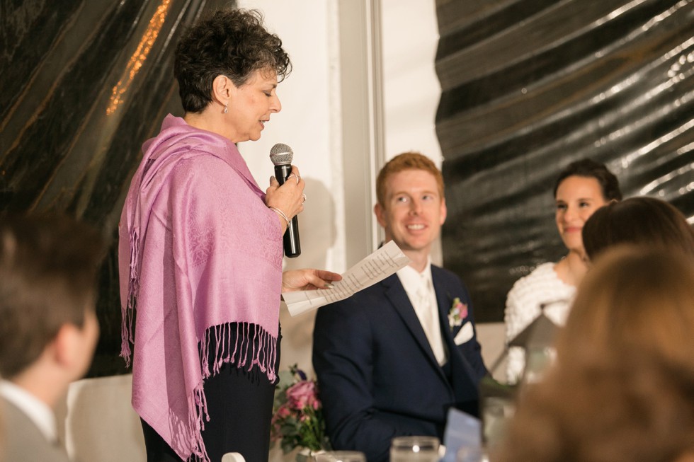 Wedding at London Town Gardens tented reception toasts