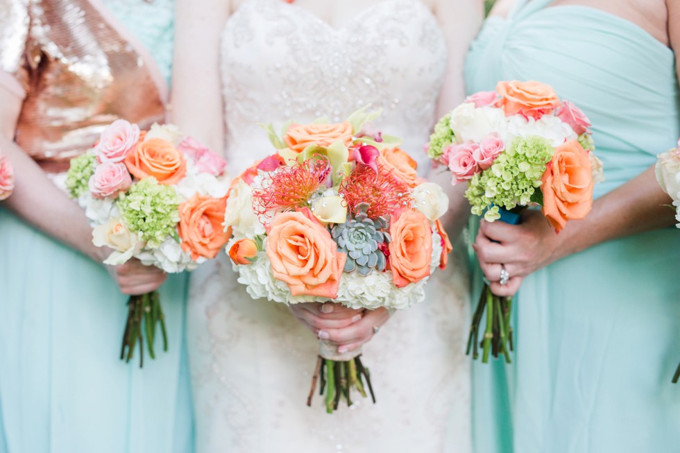 teal bridesmaid dresses - coral bouquets