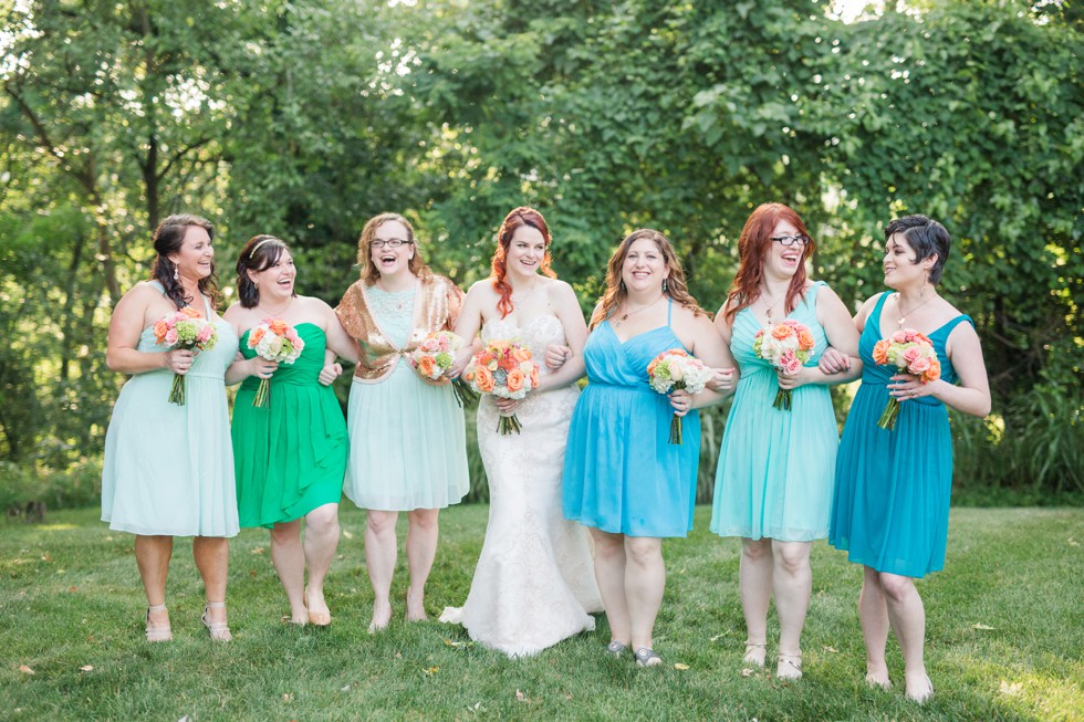 teal bridesmaid dresses - coral bouquets