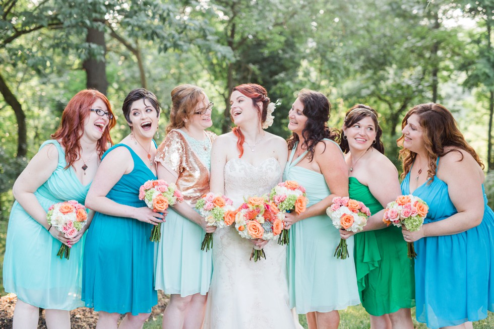 teal bridesmaid dresses - coral bouquets