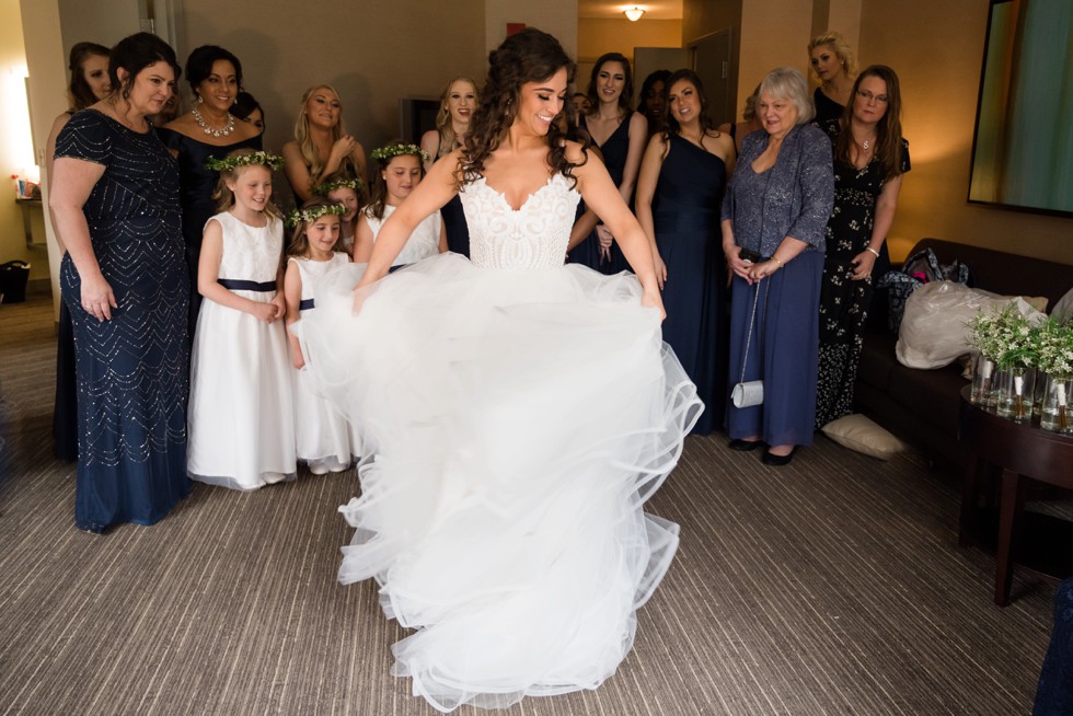 Bride twirling Westin Annapolis Hotel suite