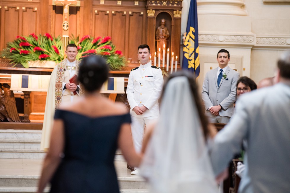 grooms first look in USNA Chapel