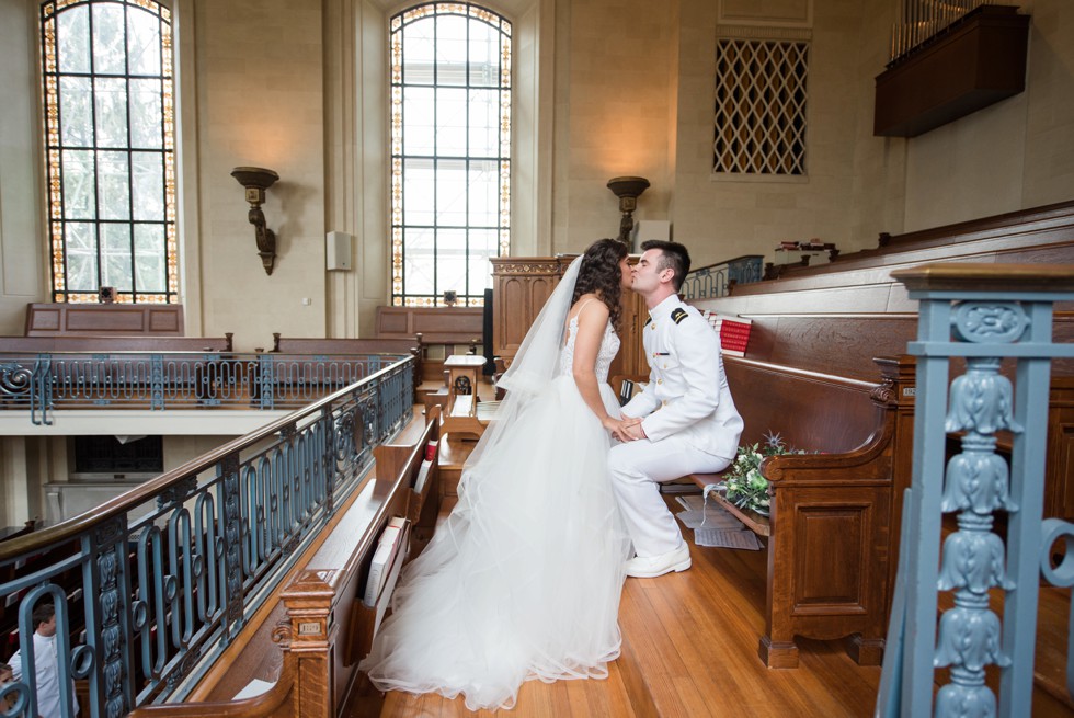 bride and groom overlooking USNA Chapel